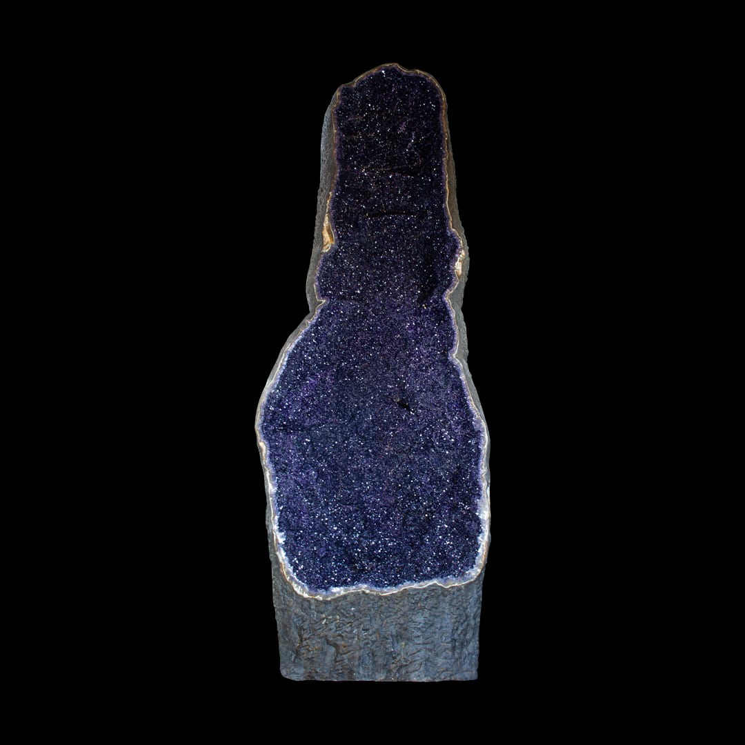 A giant open amethyst geode, standing upright