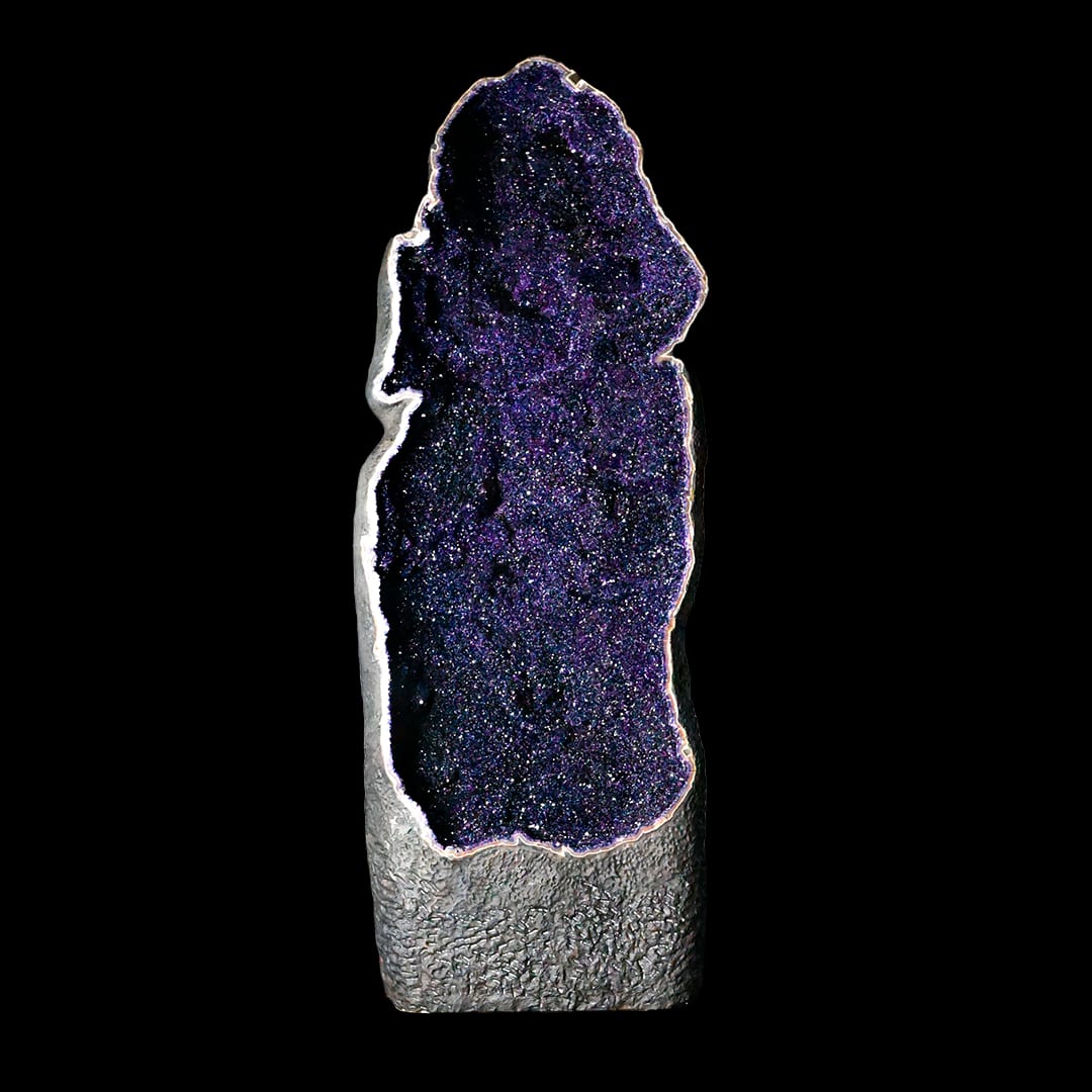 A giant open amethyst geode, standing upright